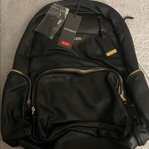 TUMI Black and Gold Backpack